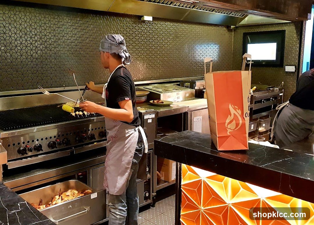 Kitchen Staff Grilling Food
