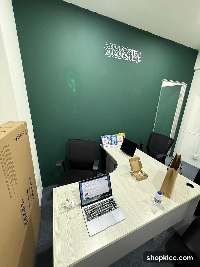 Office Desk with Laptops and Boxes