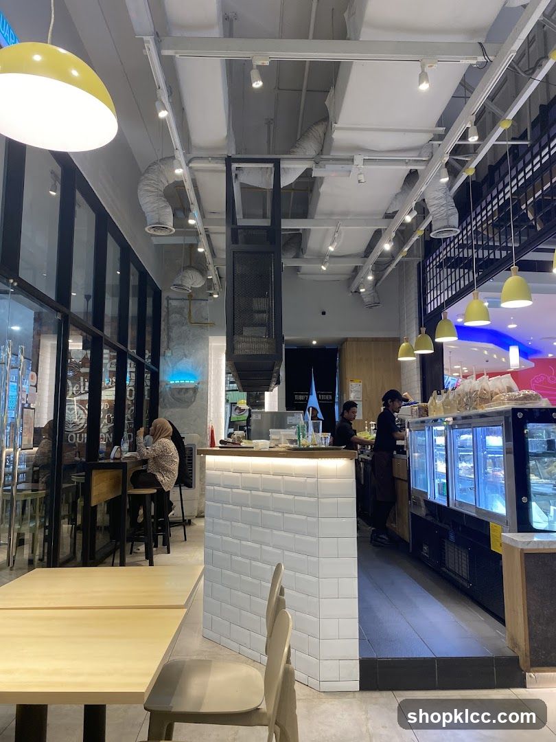 Interior of a cafe with seating and a counter