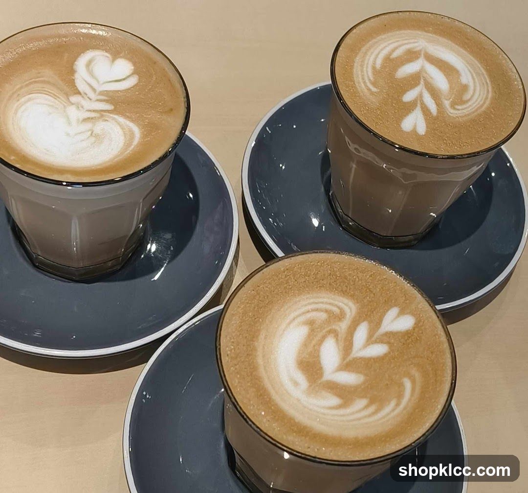 Three coffees with latte art