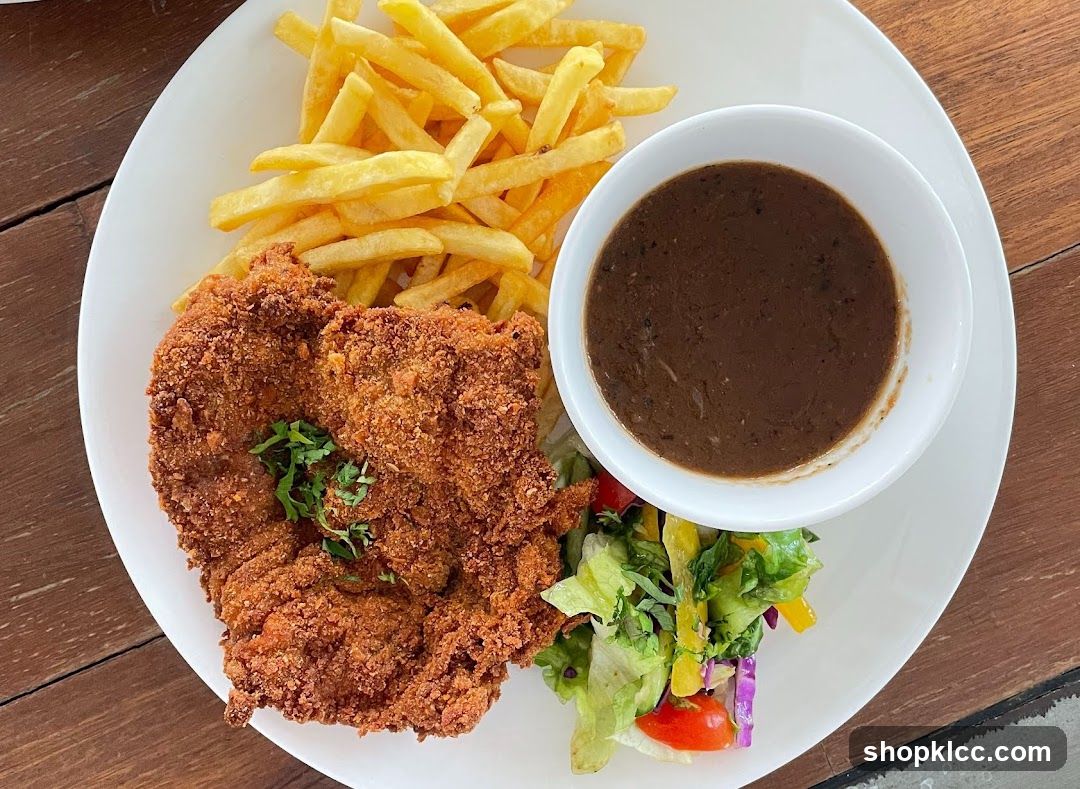 Chicken Schnitzel with Fries and Salad