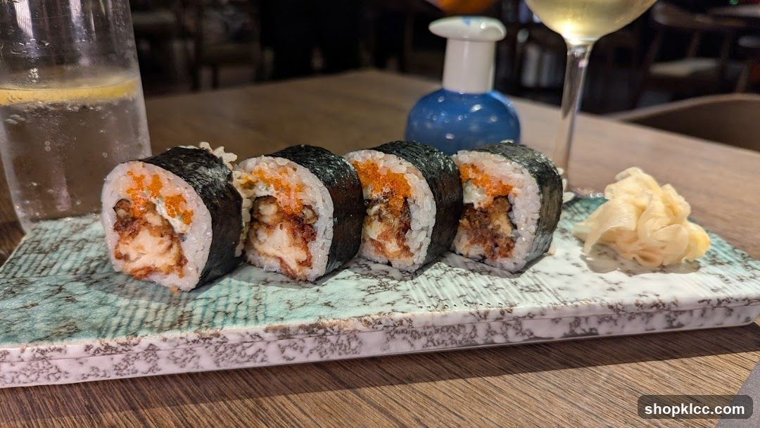 Sushi Roll with Ginger and Drink