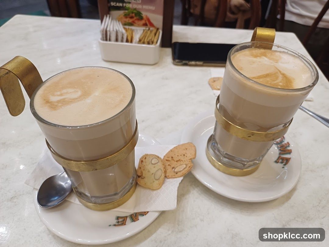 Two coffees with biscotti