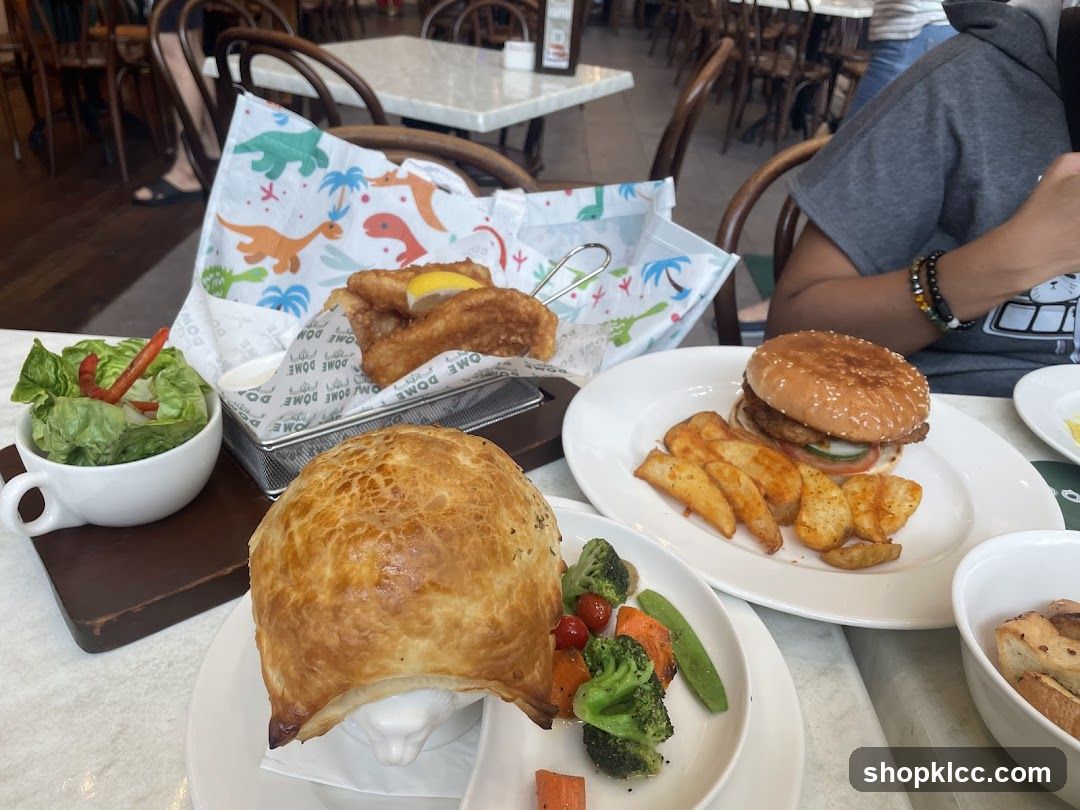 Dine-in meal with burger, fish and chips, and pie