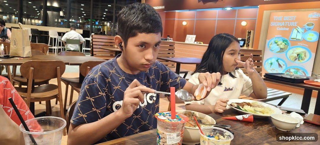 Children eating at a food court