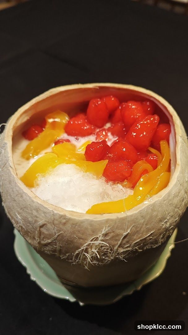 Coconut dessert with fruit and ice