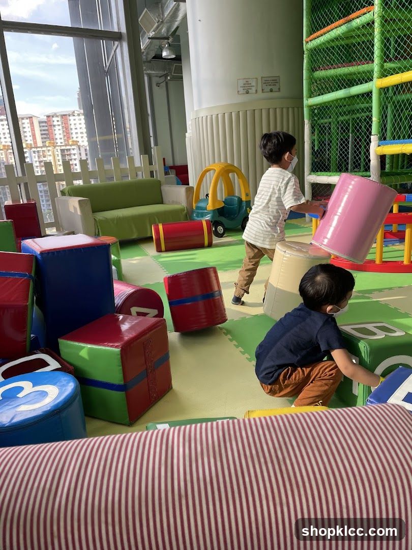Children Playing in Indoor Playground