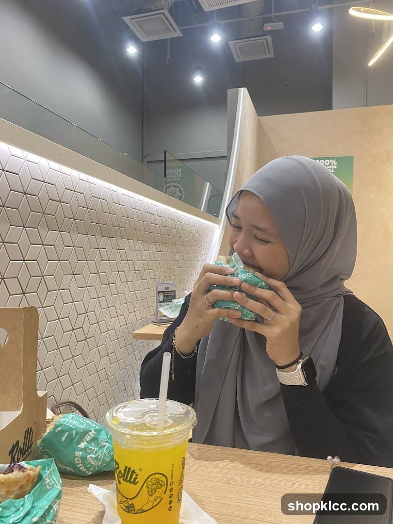 Woman eating a wrap