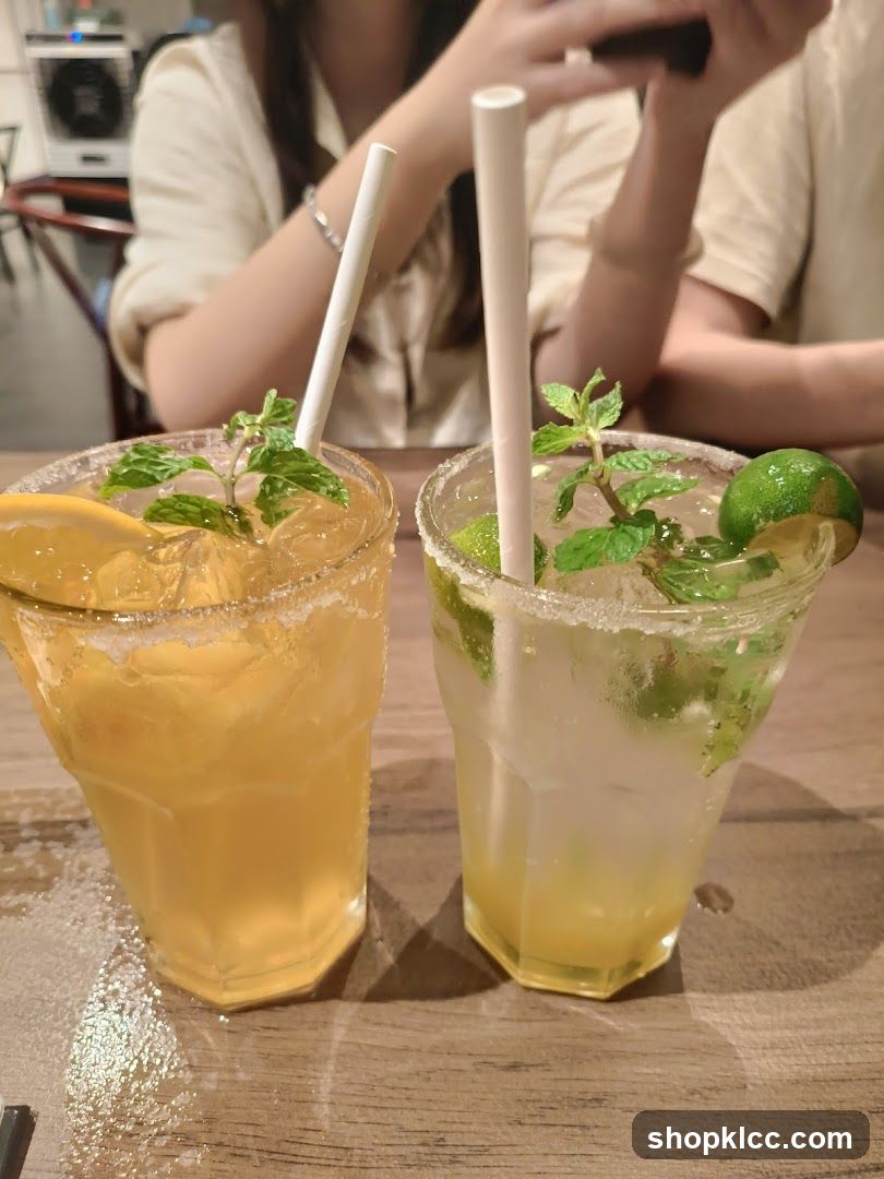 Two refreshing drinks on a wooden table