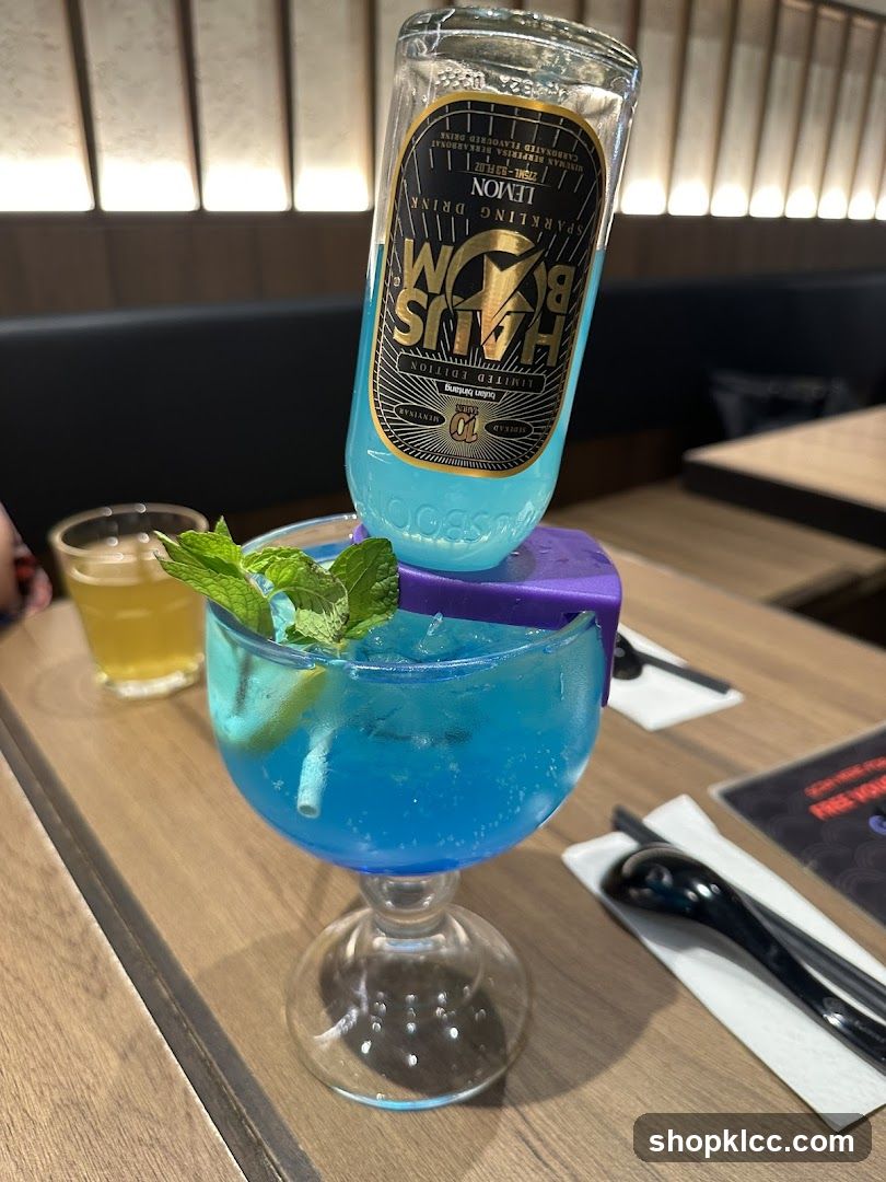 Blue Cocktail with Sparkling Drink Bottle