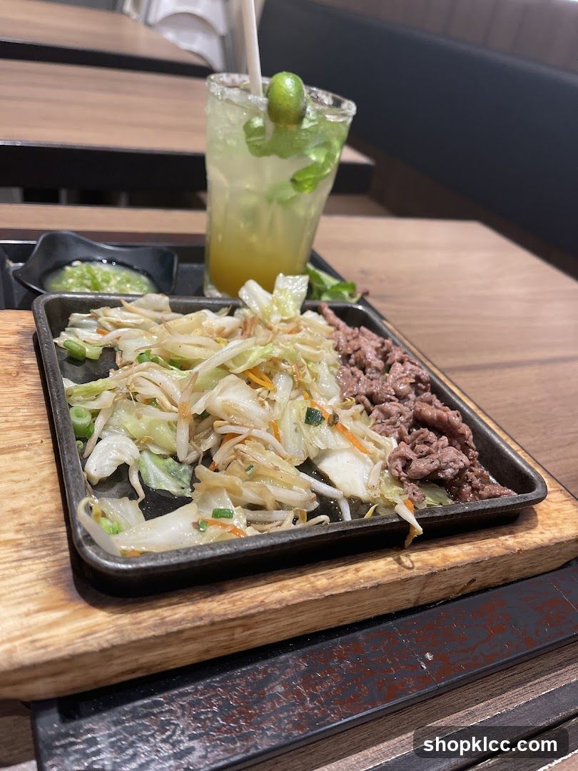 Sizzling Beef and Vegetable Stir-fry with Drink