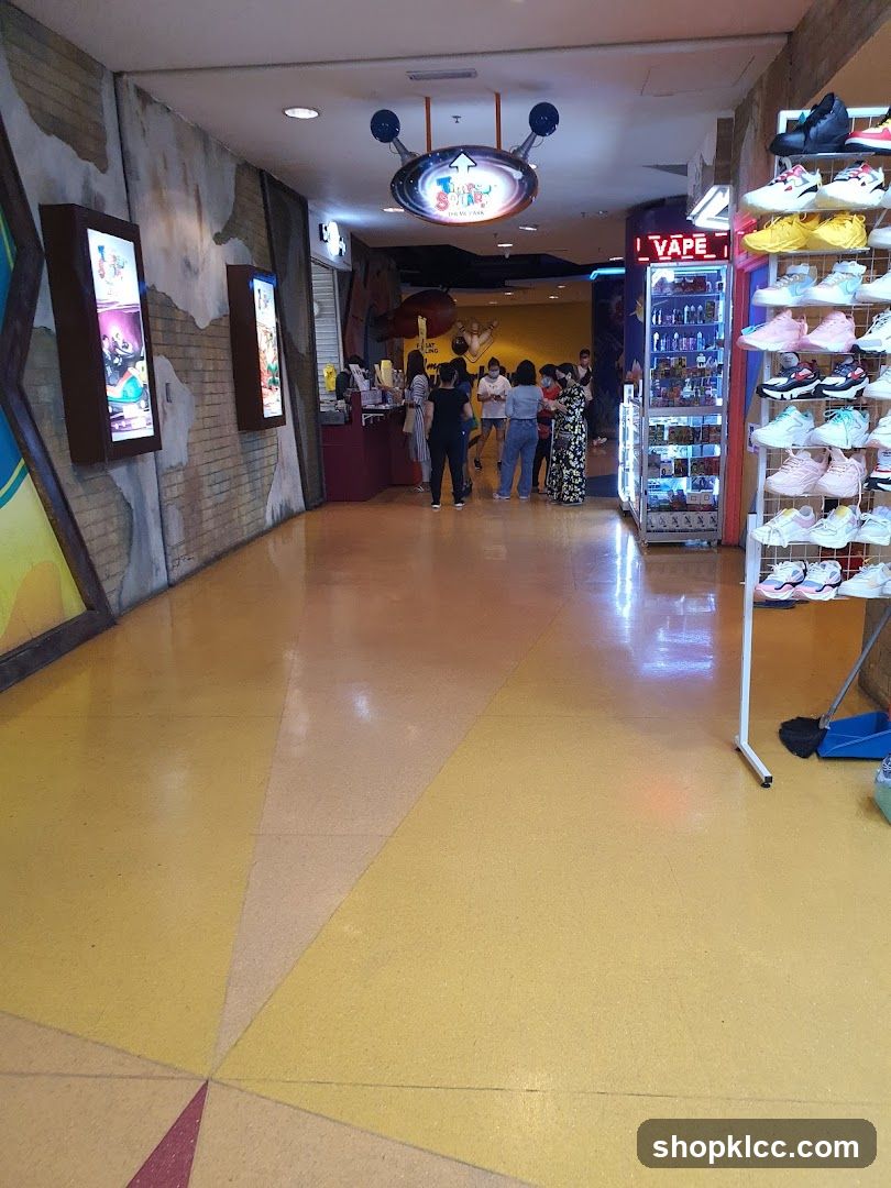 Indoor shopping area with various shops