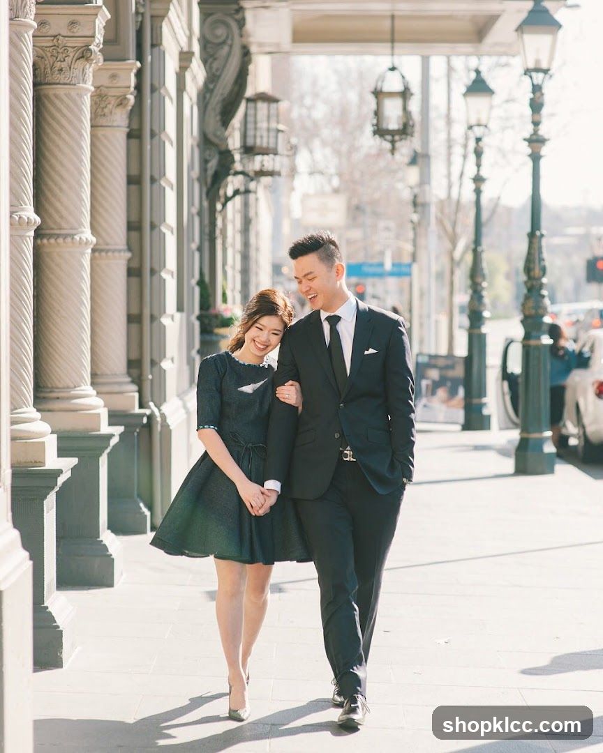 Couple walking on sidewalk