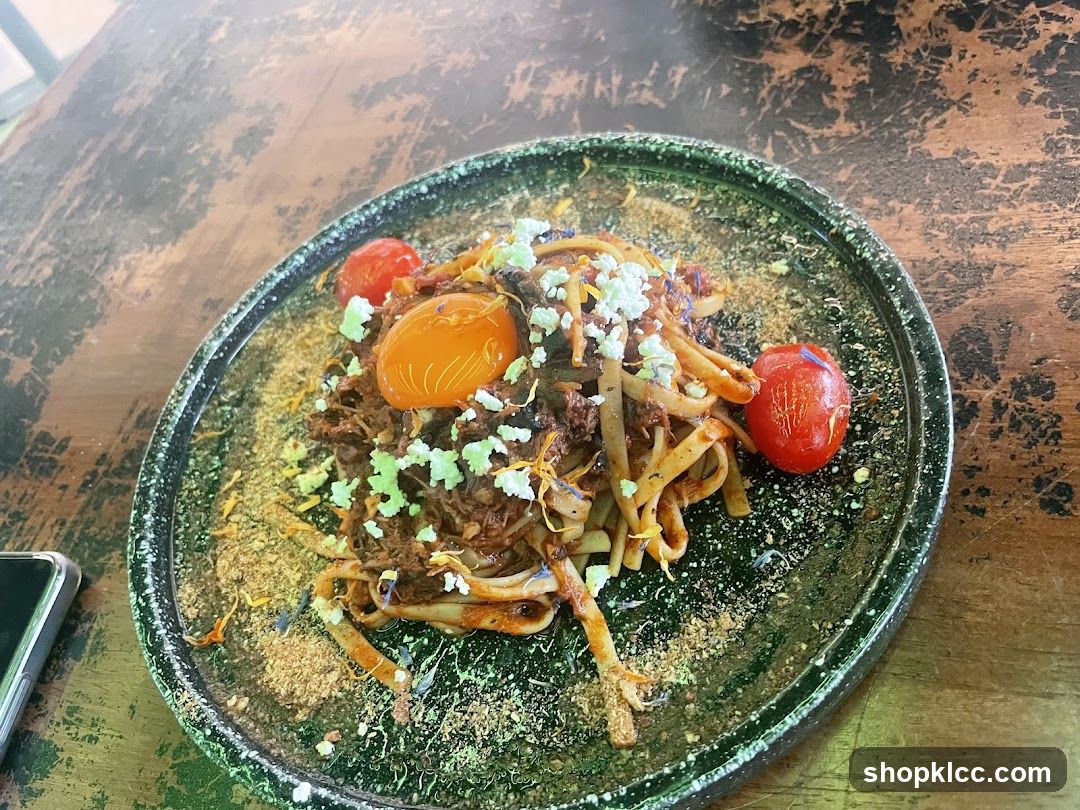 Pasta Dish with Egg Yolk and Tomatoes