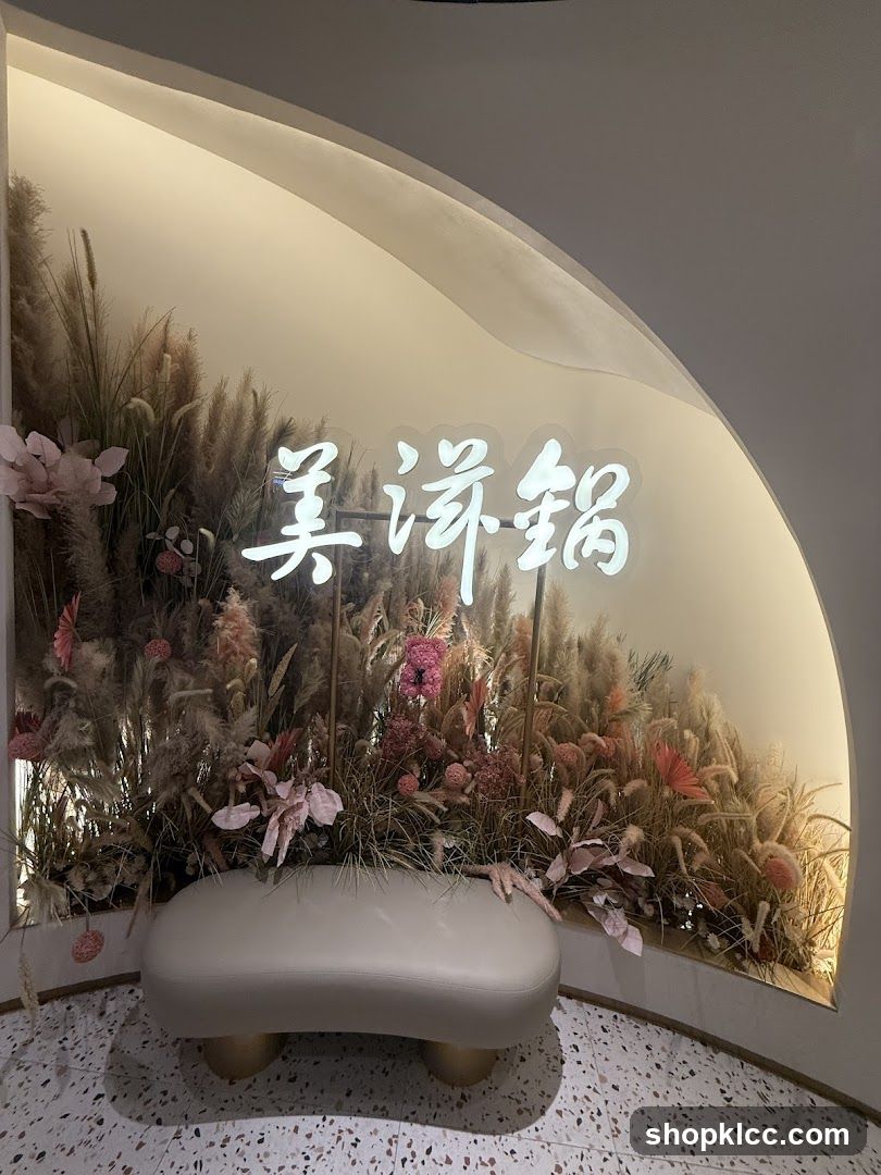 Decorative floral arrangement with neon sign