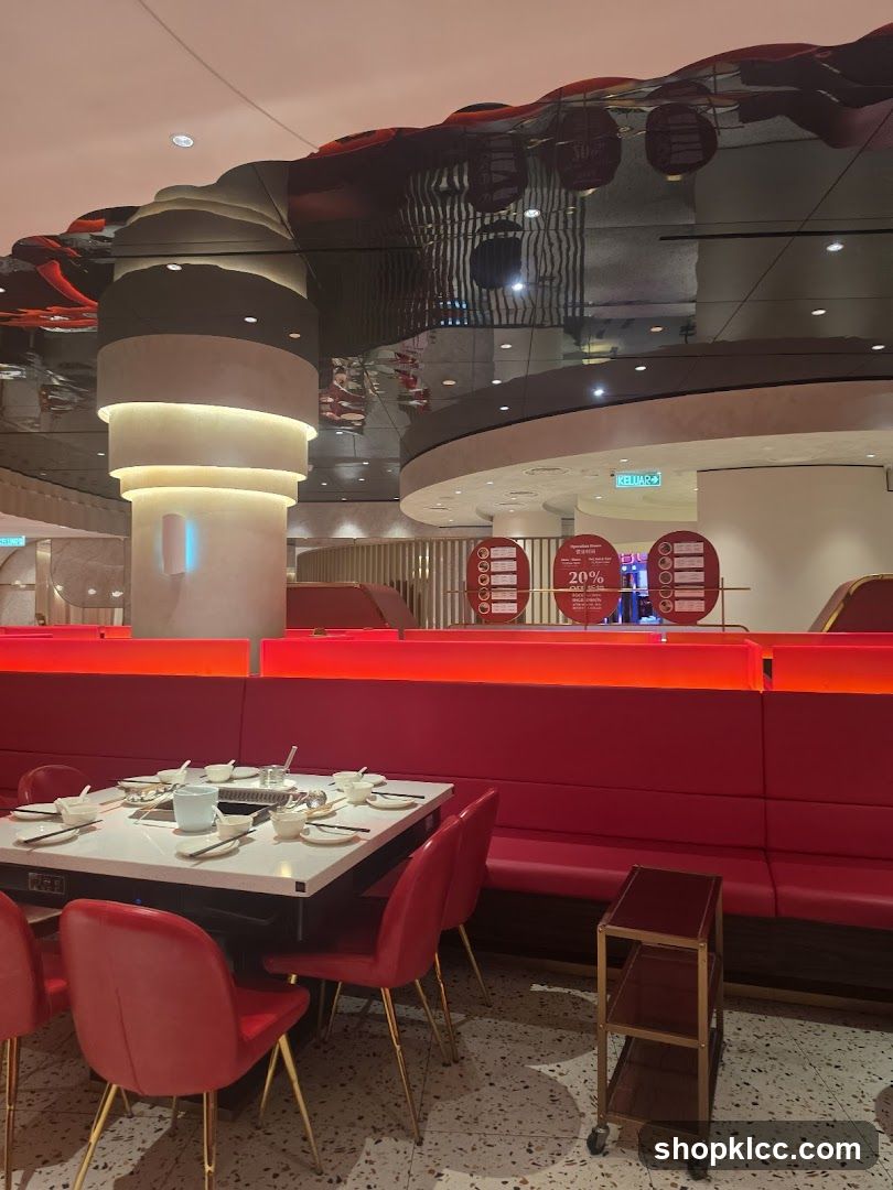 Restaurant Interior with Red Seating and Hot Pot Table