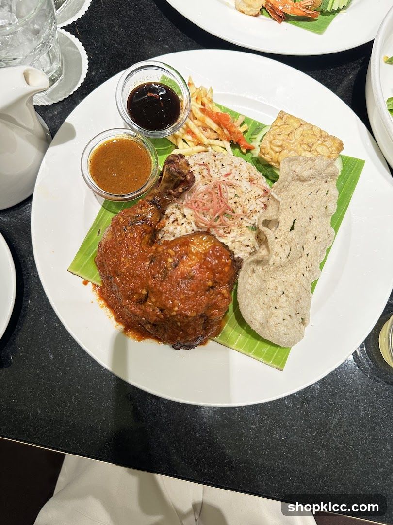 Spicy Chicken with Rice and Sides