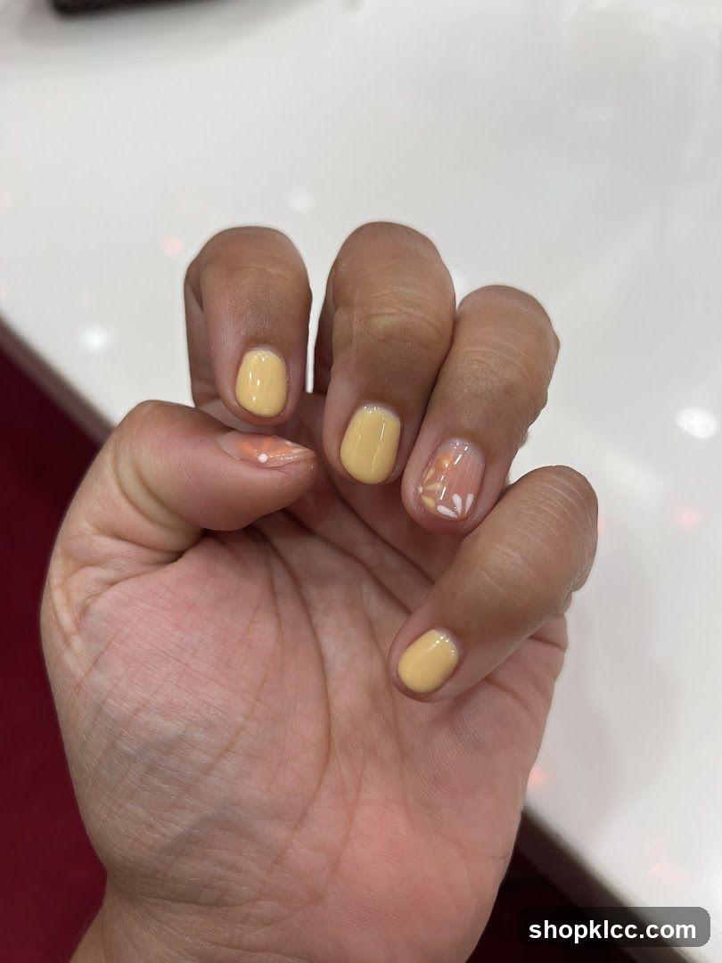 Yellow and floral nail art