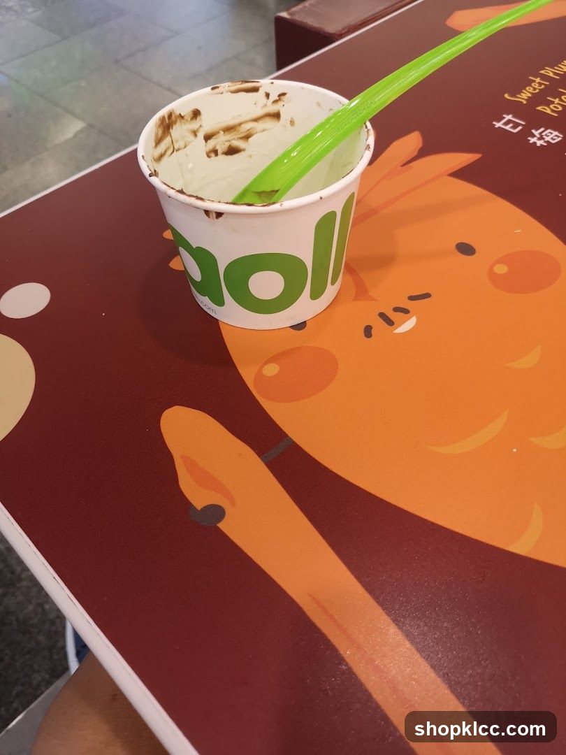 Dessert Cup with Spoon on Table