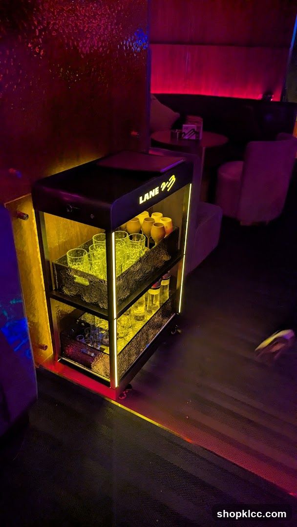 Bar Cart with Glasses and Bottles