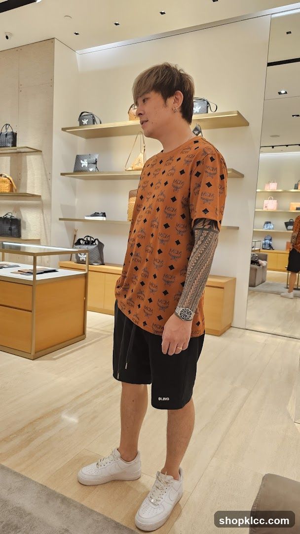 Man in MCM Shirt in Store