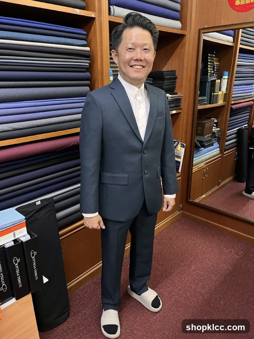 Man in a Suit in a Fabric Store