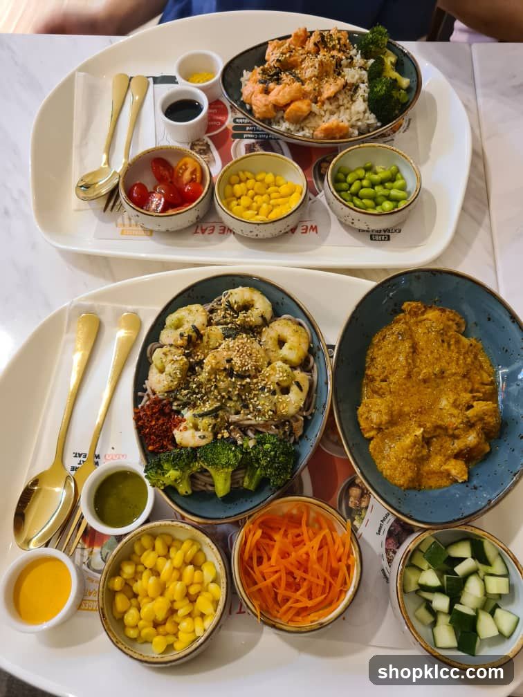 Two bowls of food with side dishes