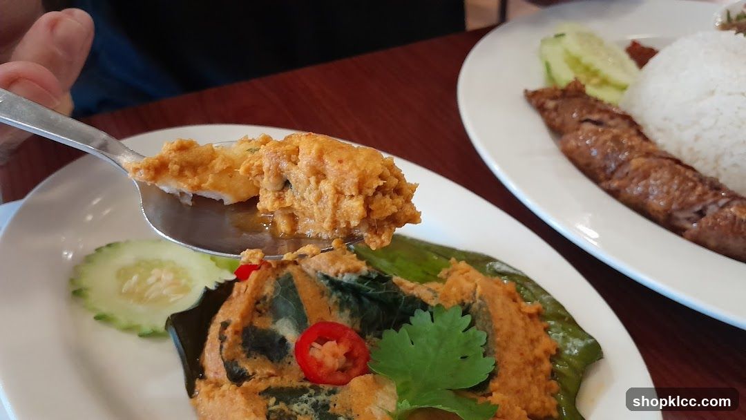 Spoonful of Steamed Fish Curry