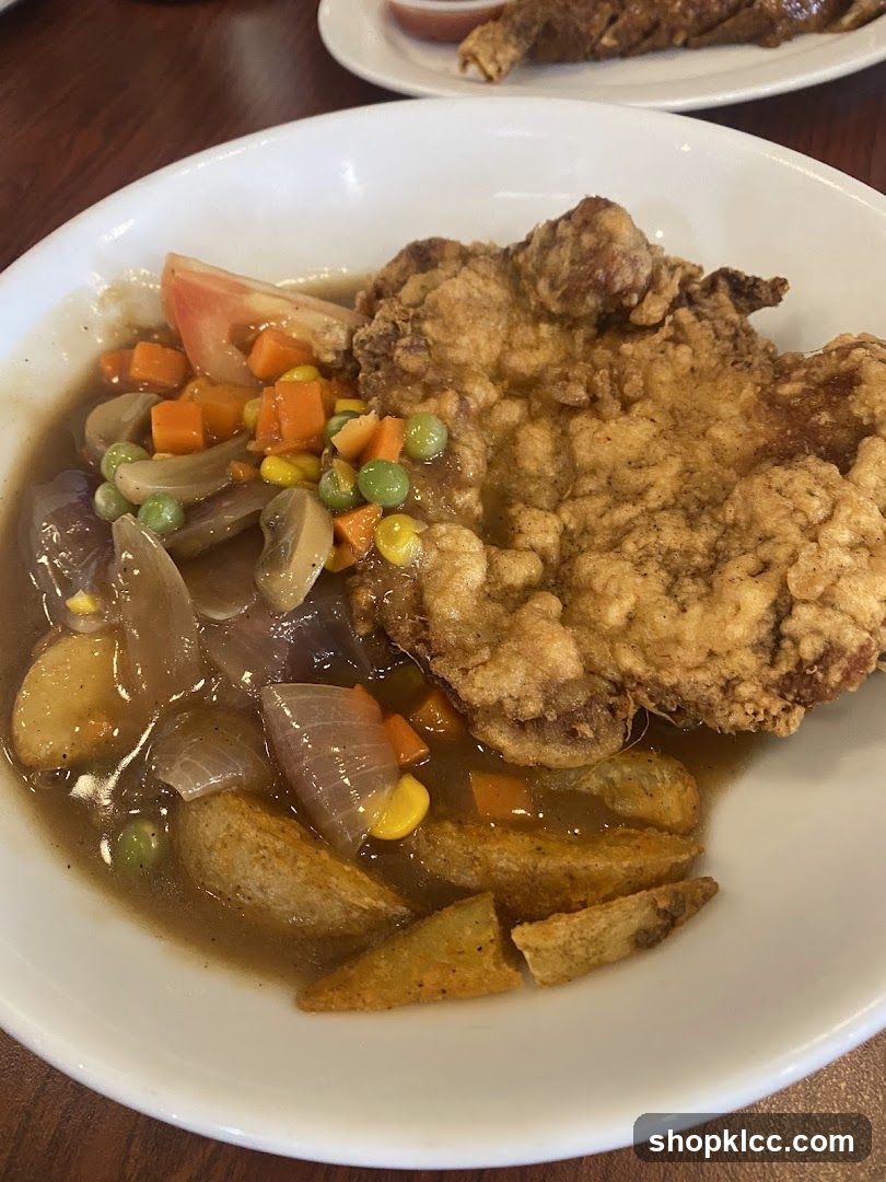 Fried Pork Chop with Gravy and Vegetables