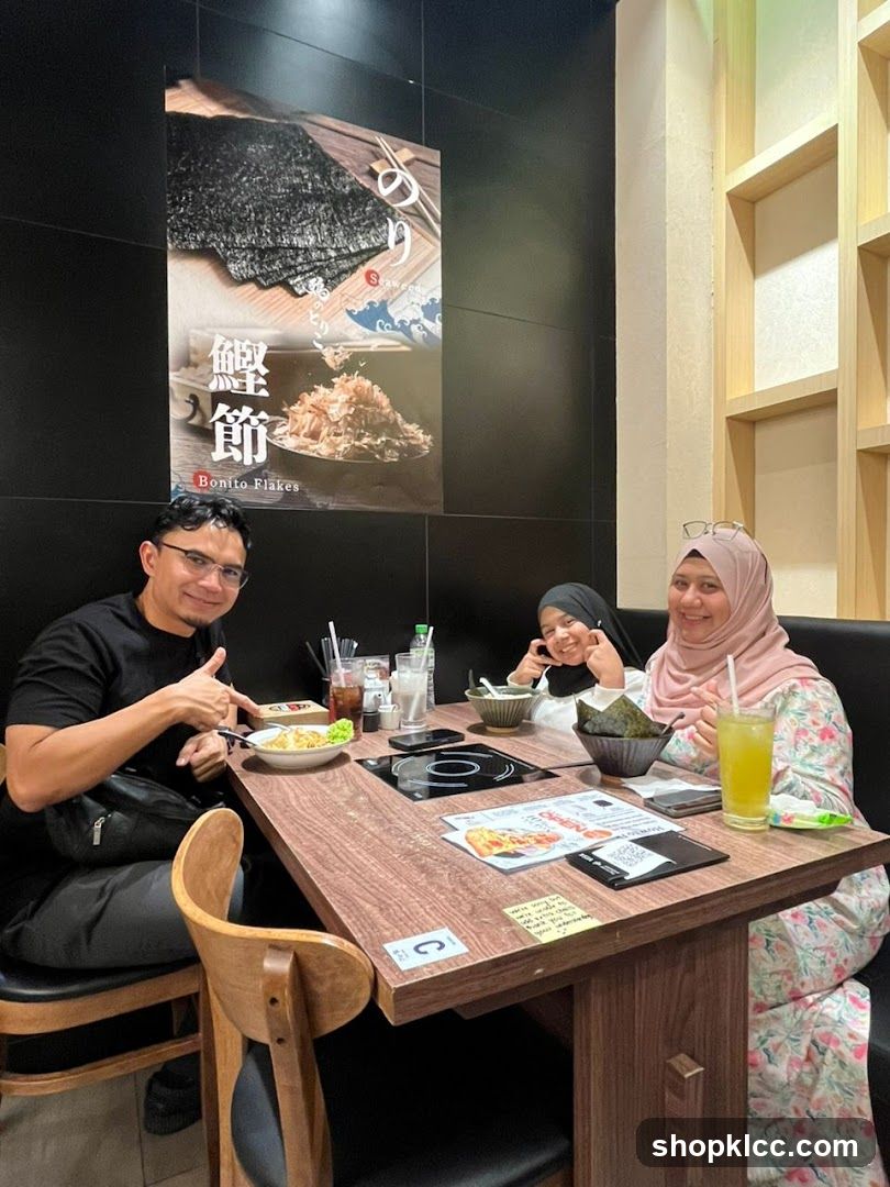 Family enjoying a meal at a restaurant