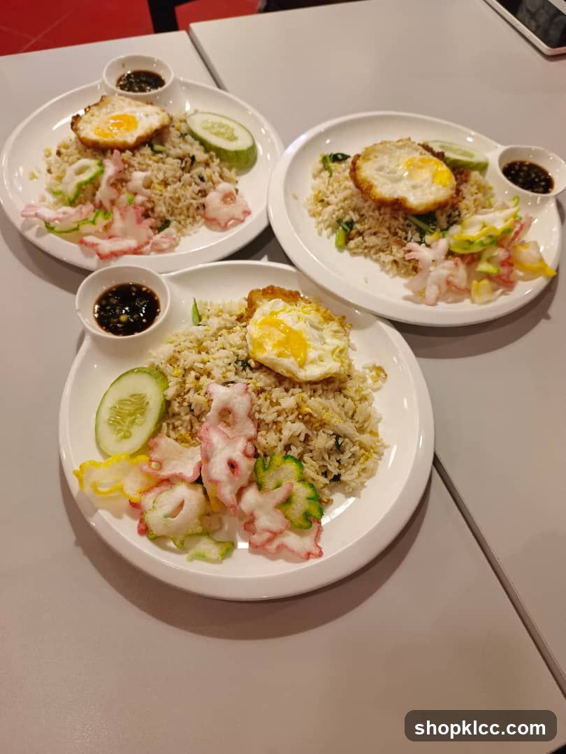 Three plates of fried rice