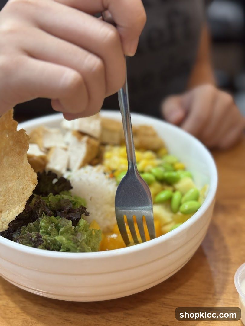 Close-up of a poke bowl with a fork