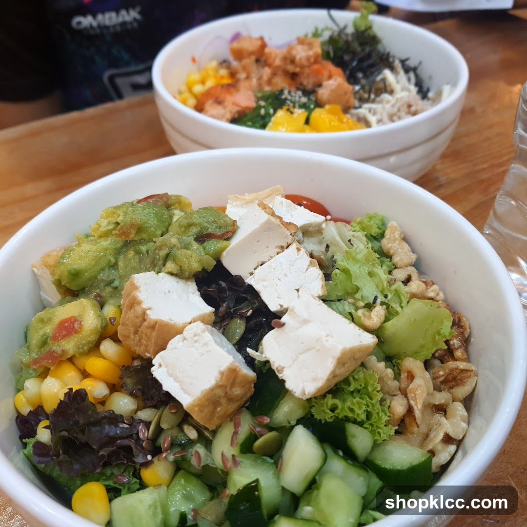 Two bowls of poke bowls