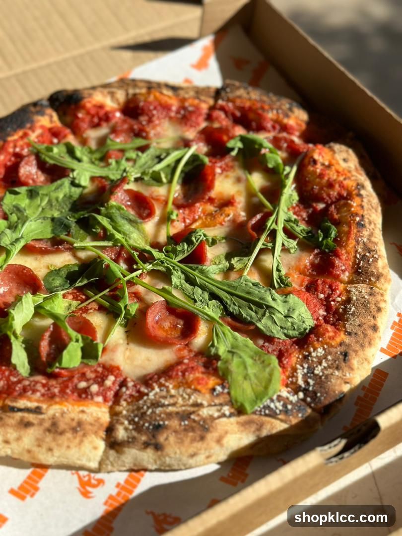 Pepperoni and Arugula Pizza