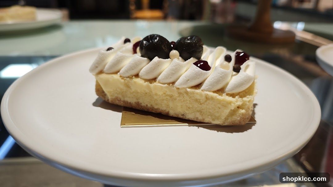 Cheesecake Slice with Berries and Cream