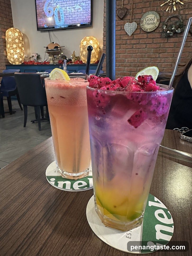 Two colorful drinks on a table