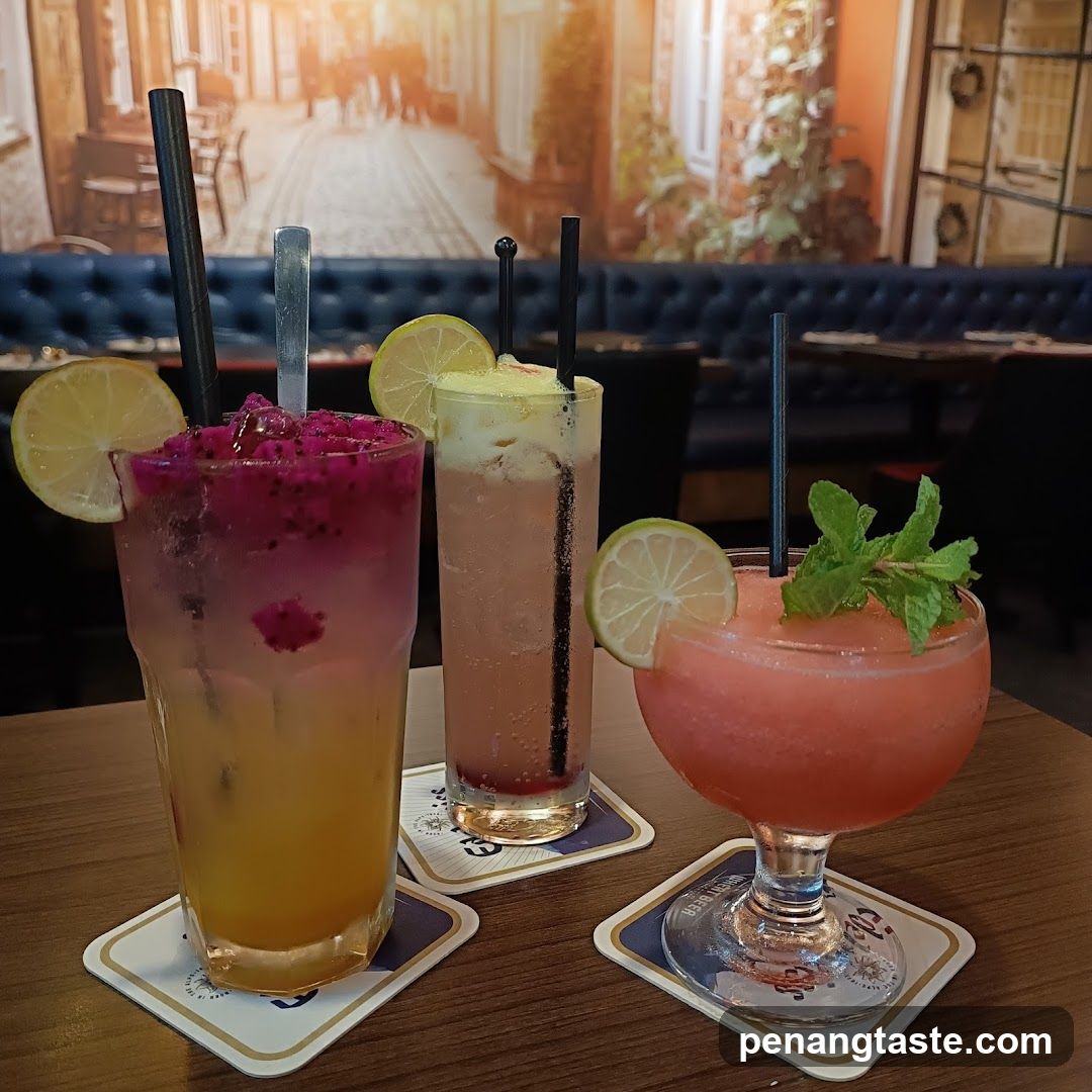 Three colorful drinks on a table