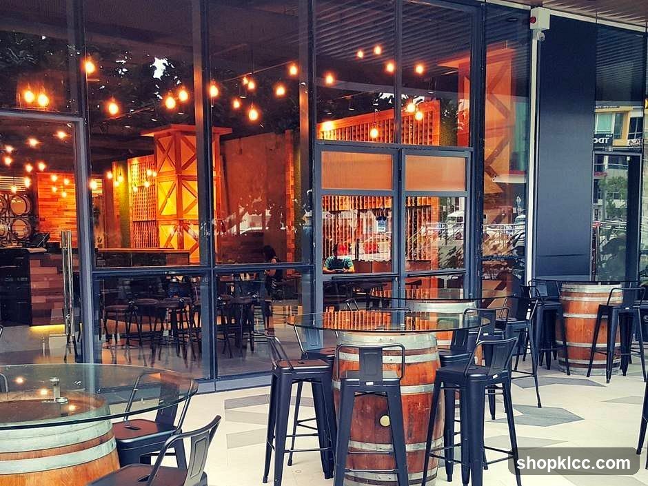 Outdoor seating area with barrel tables