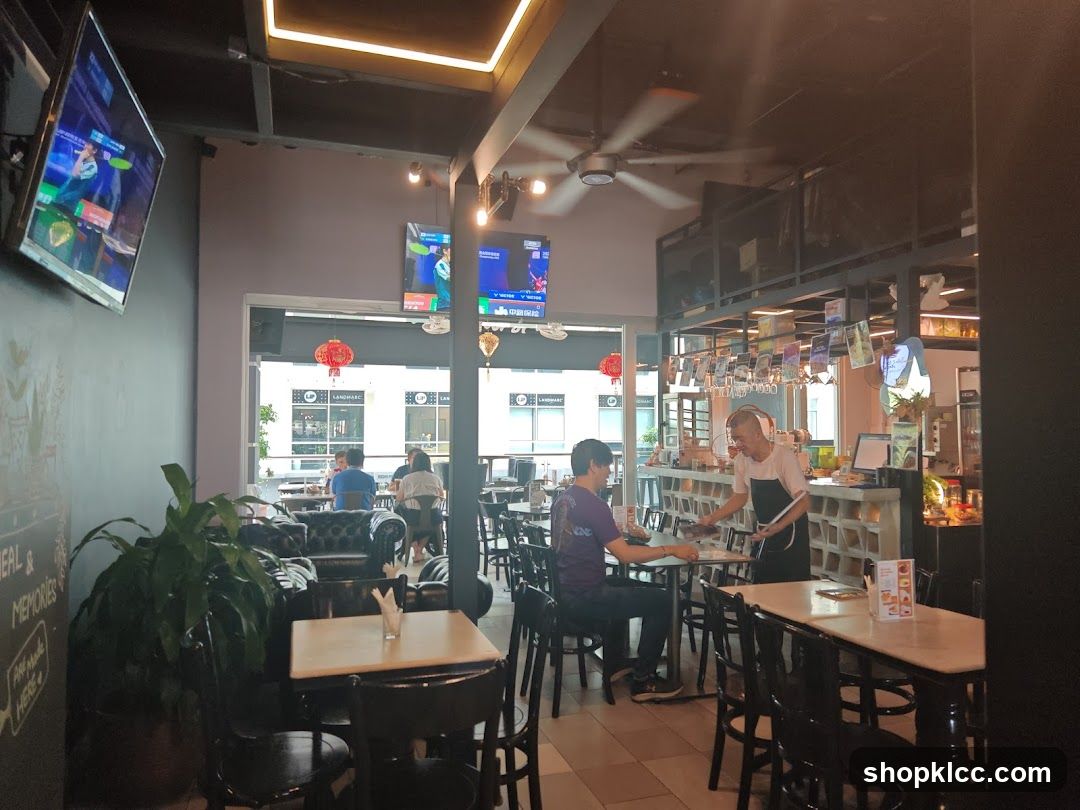 Restaurant Interior with TVs and Seating