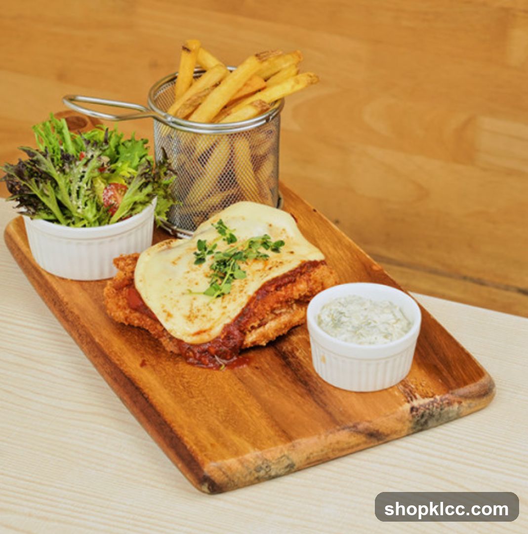 Chicken Parmigiana with Fries and Salad