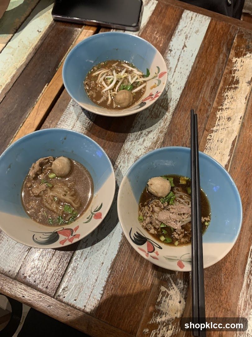 Three bowls of noodle soup