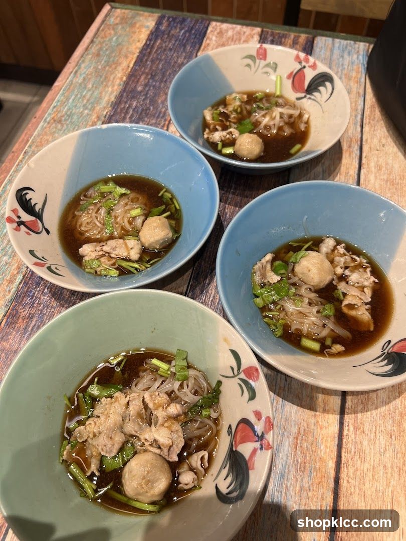 Four bowls of noodle soup
