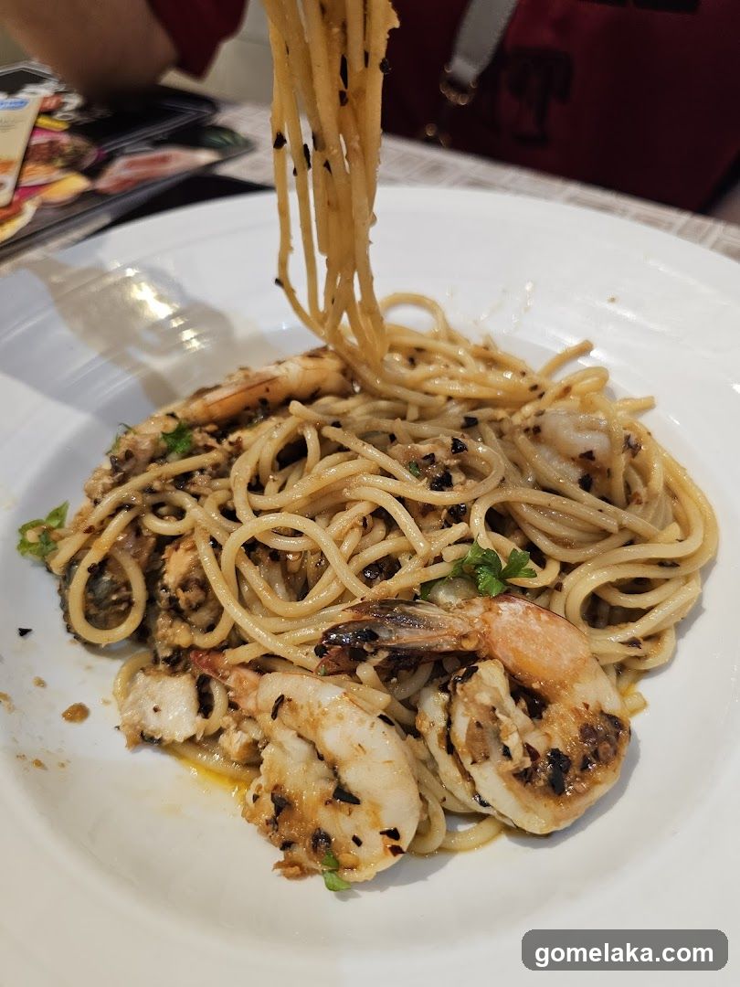 Pasta Dish Being Lifted with Fork
