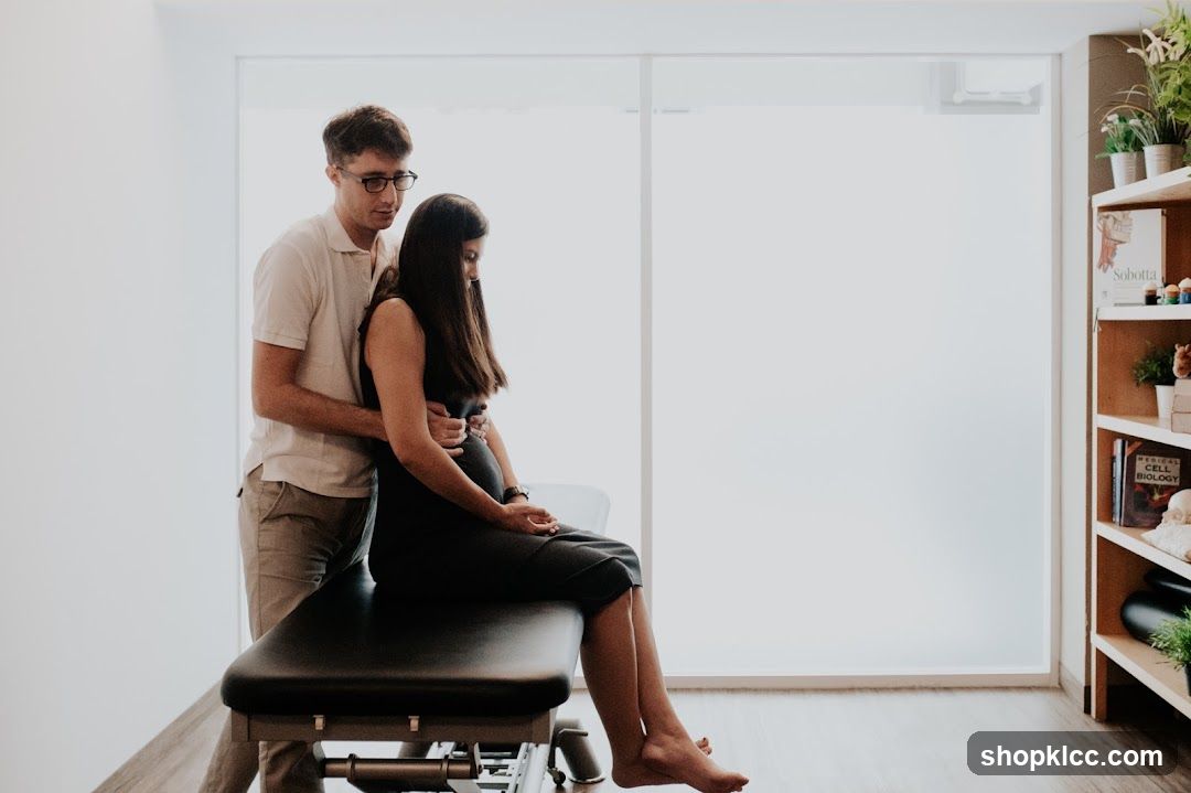Therapist assisting a patient