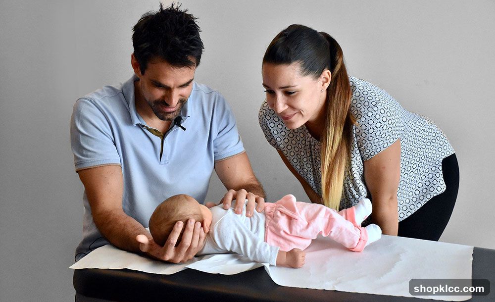 People practicing infant care