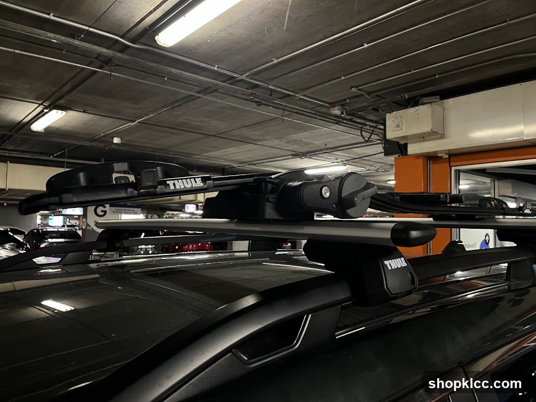 Car with Thule roof rack in parking garage