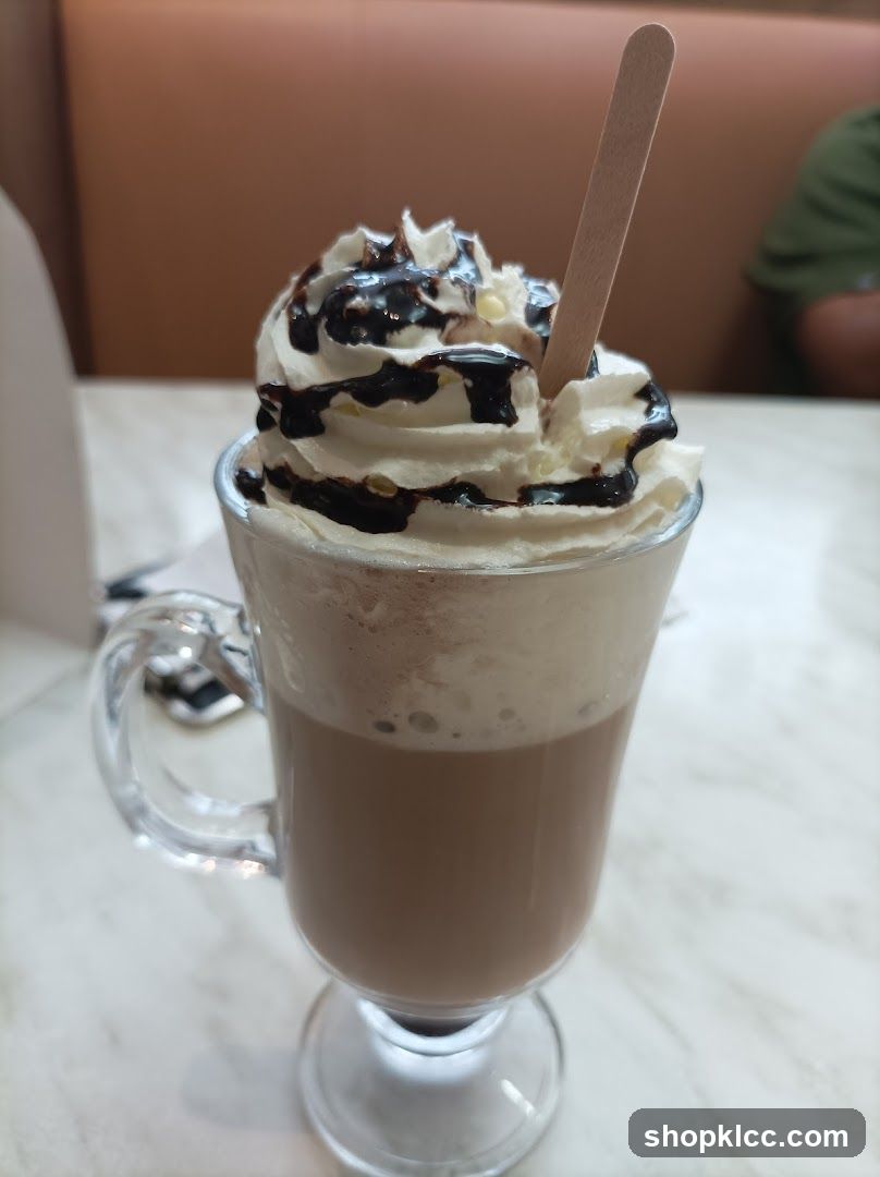 Hot Chocolate with Whipped Cream and Chocolate Drizzle