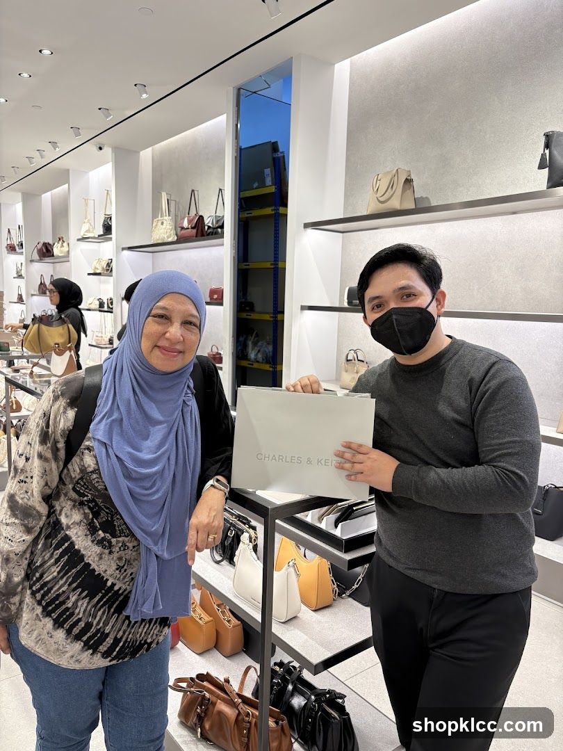 People in a handbag store