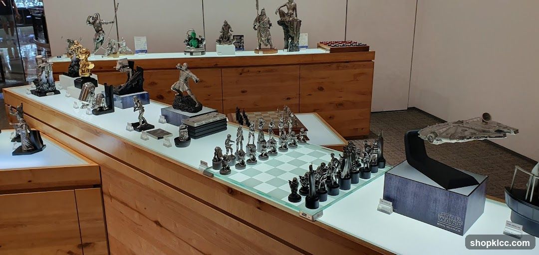 Display of Collectible Figurines and Chess Sets