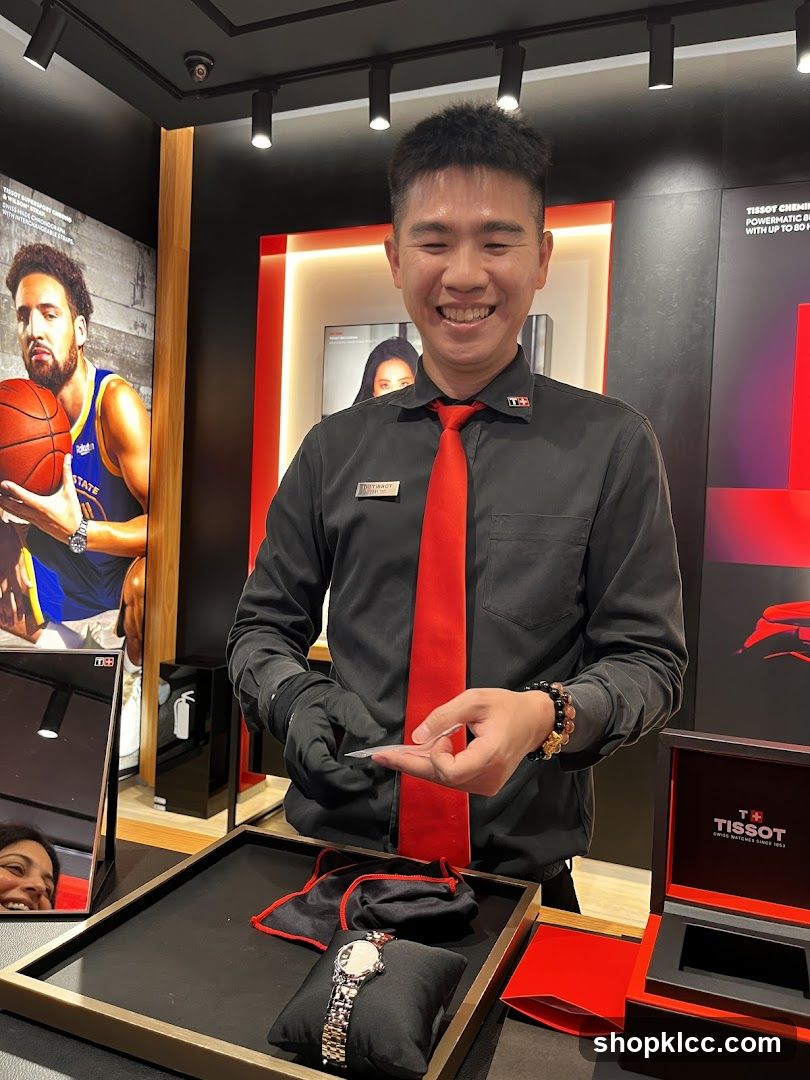 Salesperson showing a watch